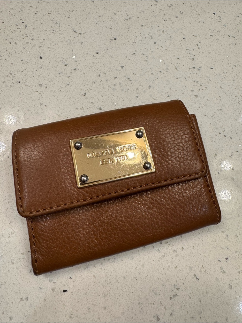 Michael Kors Cognac Pebbled Leather Trifold Wallet with Gold Plaque
